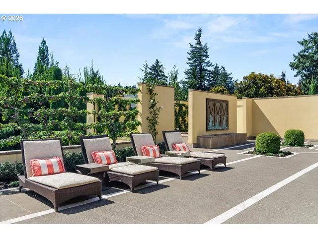 a view of a living room and chandelier