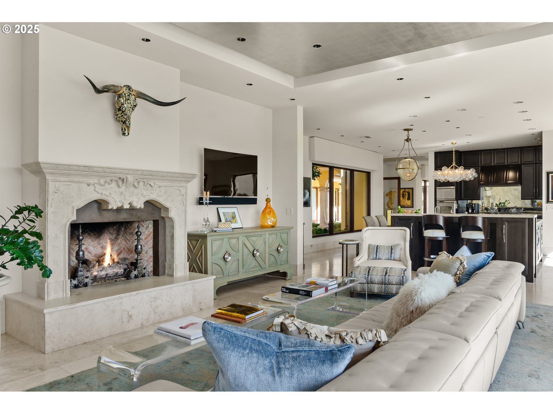 8418 Valley Way Southeast Turner, OR 97392 - Photo 5 of 48 a living room with furniture flat screen tv and a fireplace
