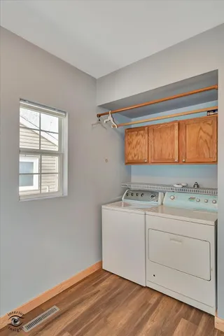 a bathroom with a sink and a window