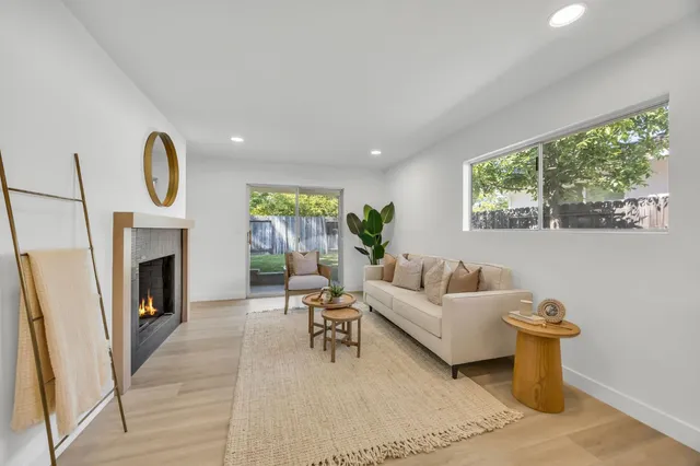 a kitchen with stove and sink
