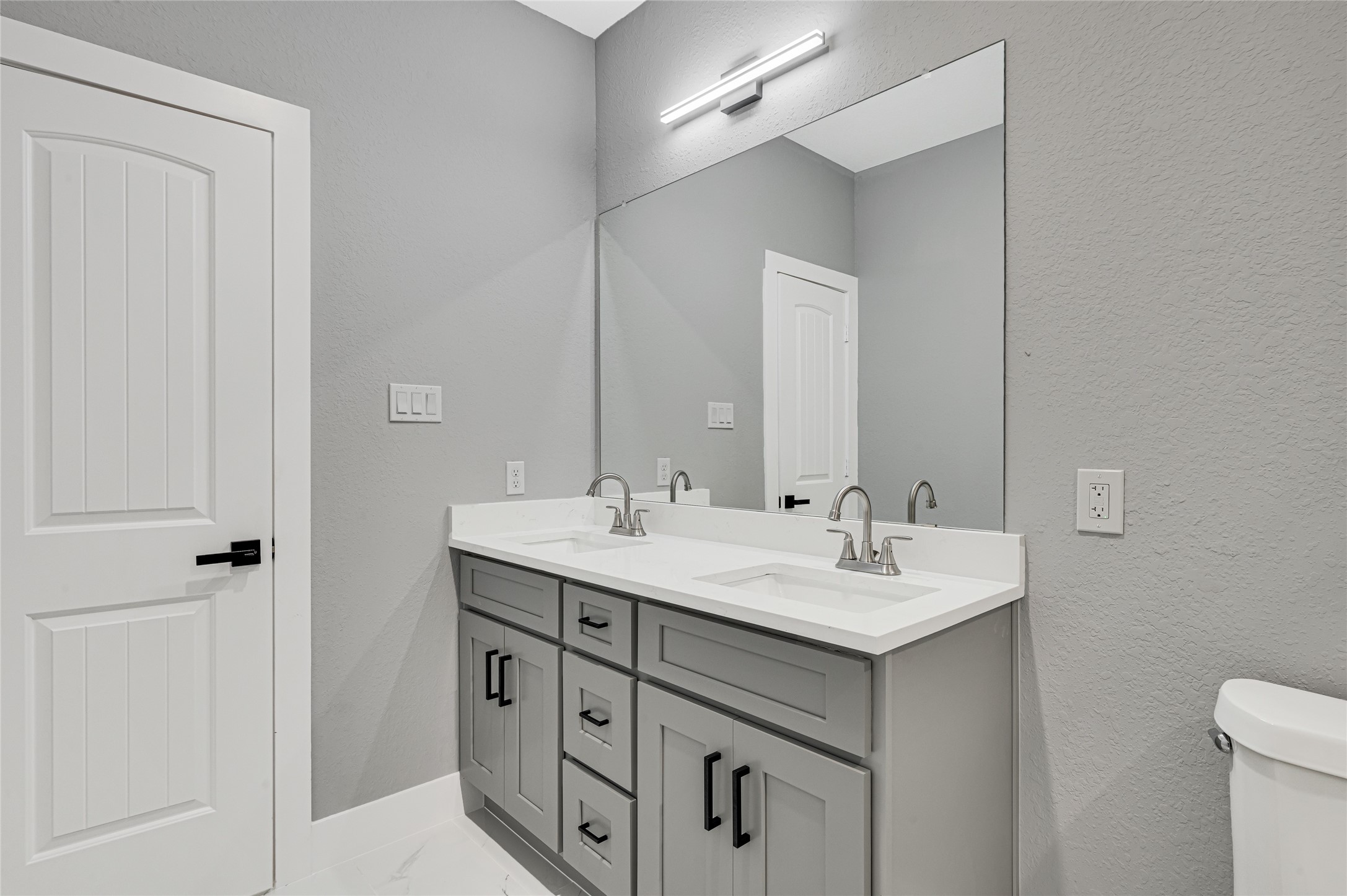 5930 Boness Road, Unit A & B Houston, TX 77396 - Photo 28 of 43 Elegant master vanity with dual sinks.