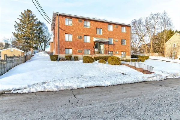 a swimming pool with outdoor seating