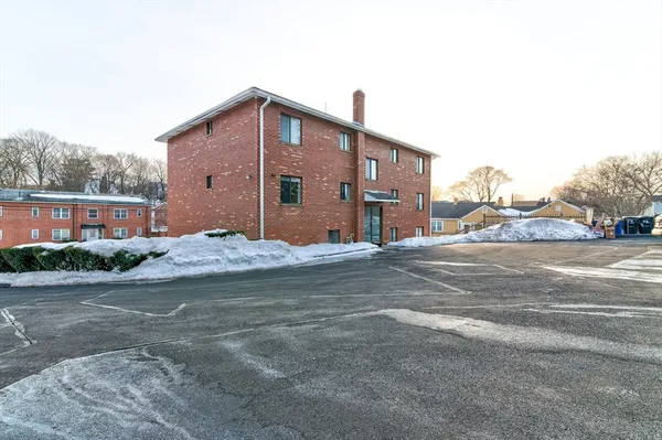 a view of street with large building
