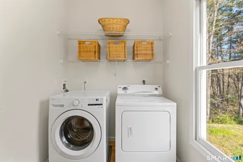 a utility room with dryer and washer
