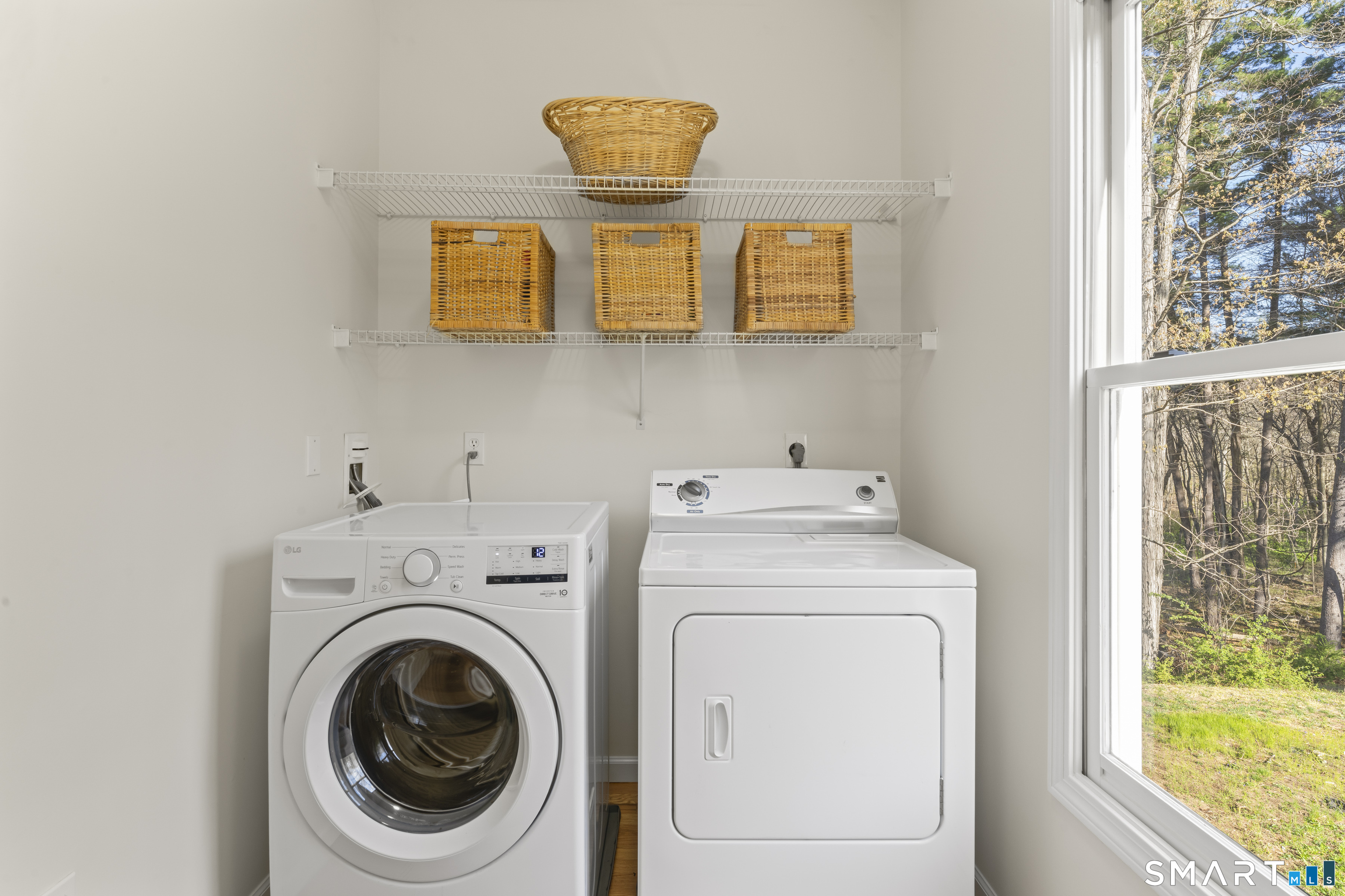 5 Beagle Trail Newtown, CT 06482 - Photo 24 of 40 a utility room with dryer and washer
