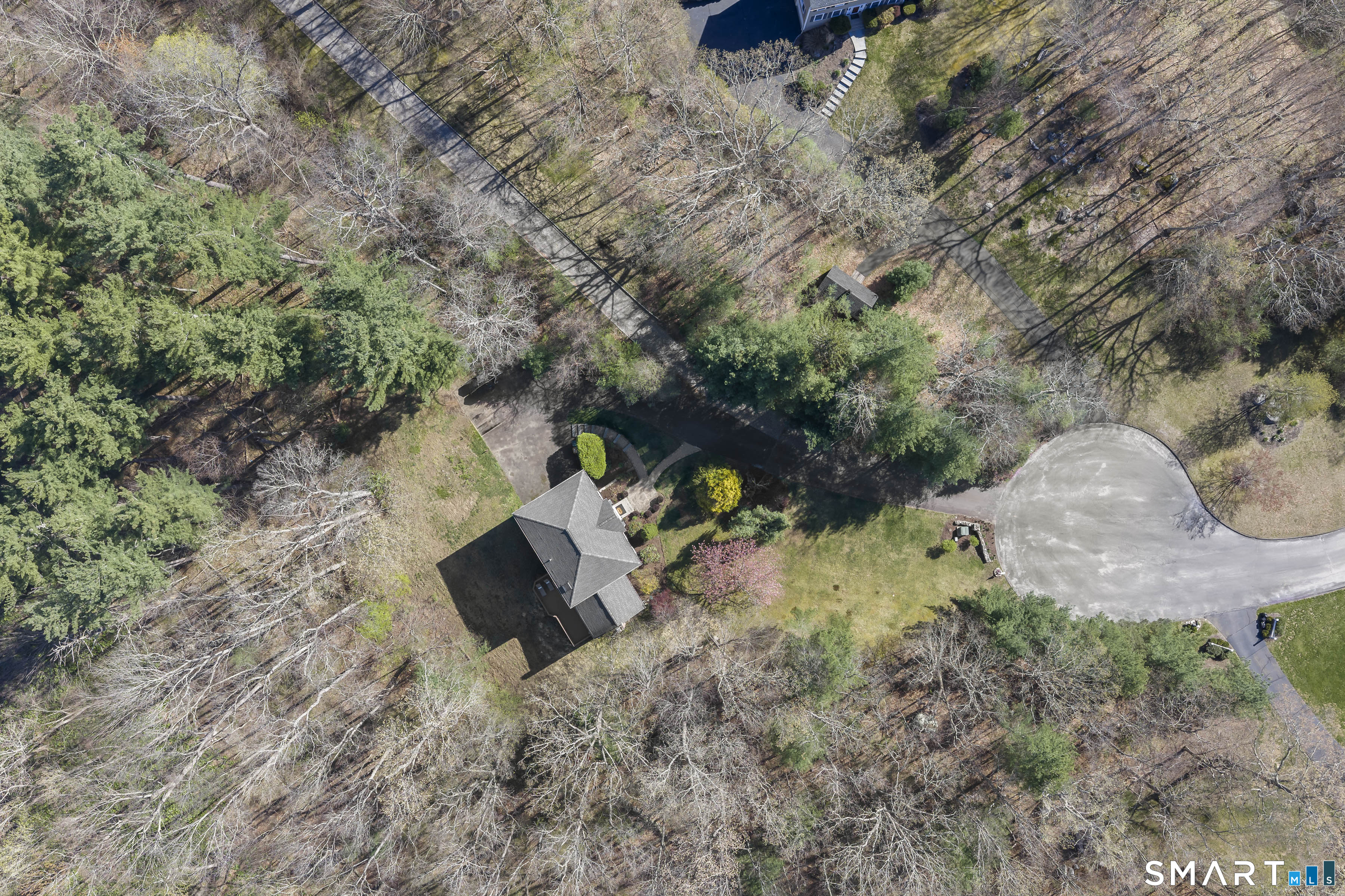 5 Beagle Trail Newtown, CT 06482 - Photo 3 of 40 a view of a yard with a tree