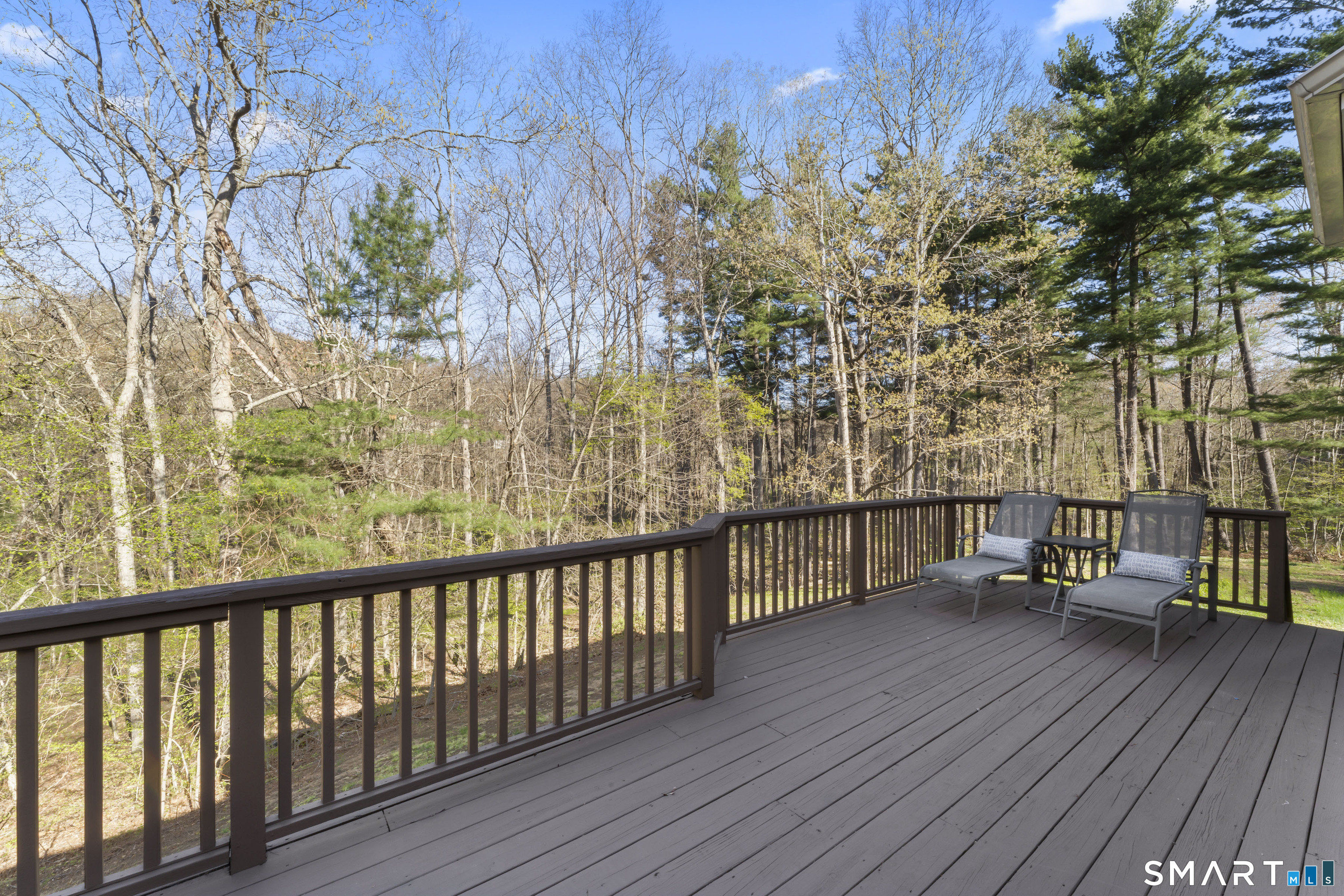 5 Beagle Trail Newtown, CT 06482 - Photo 39 of 40 a view of balcony with wooden floor and fence