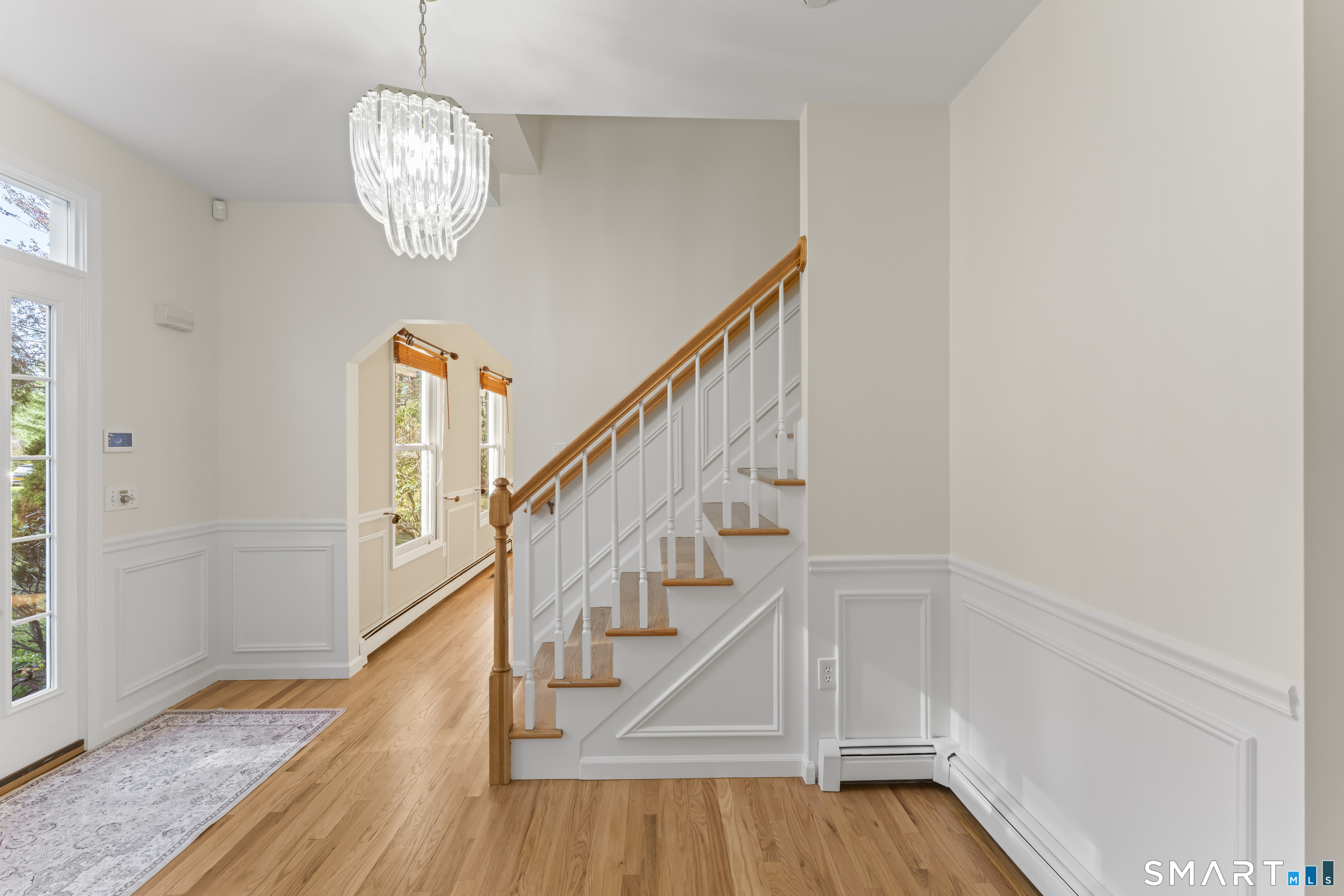 5 Beagle Trail Newtown, CT 06482 - Photo 5 of 40 a view of entryway and hall with wooden floor