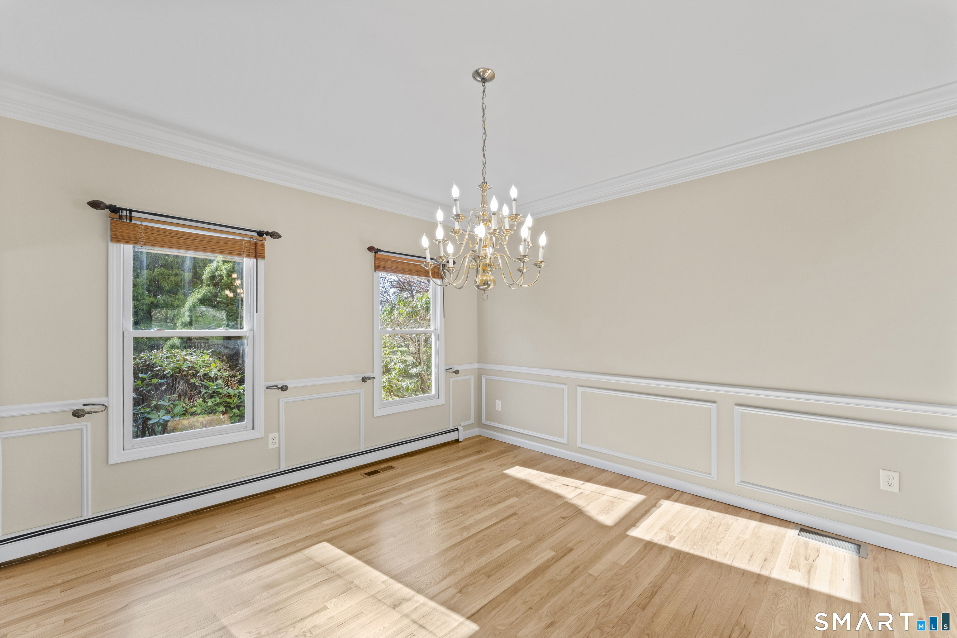 5 Beagle Trail Newtown, CT 06482 - Photo 8 of 40 a view of an empty room with a window