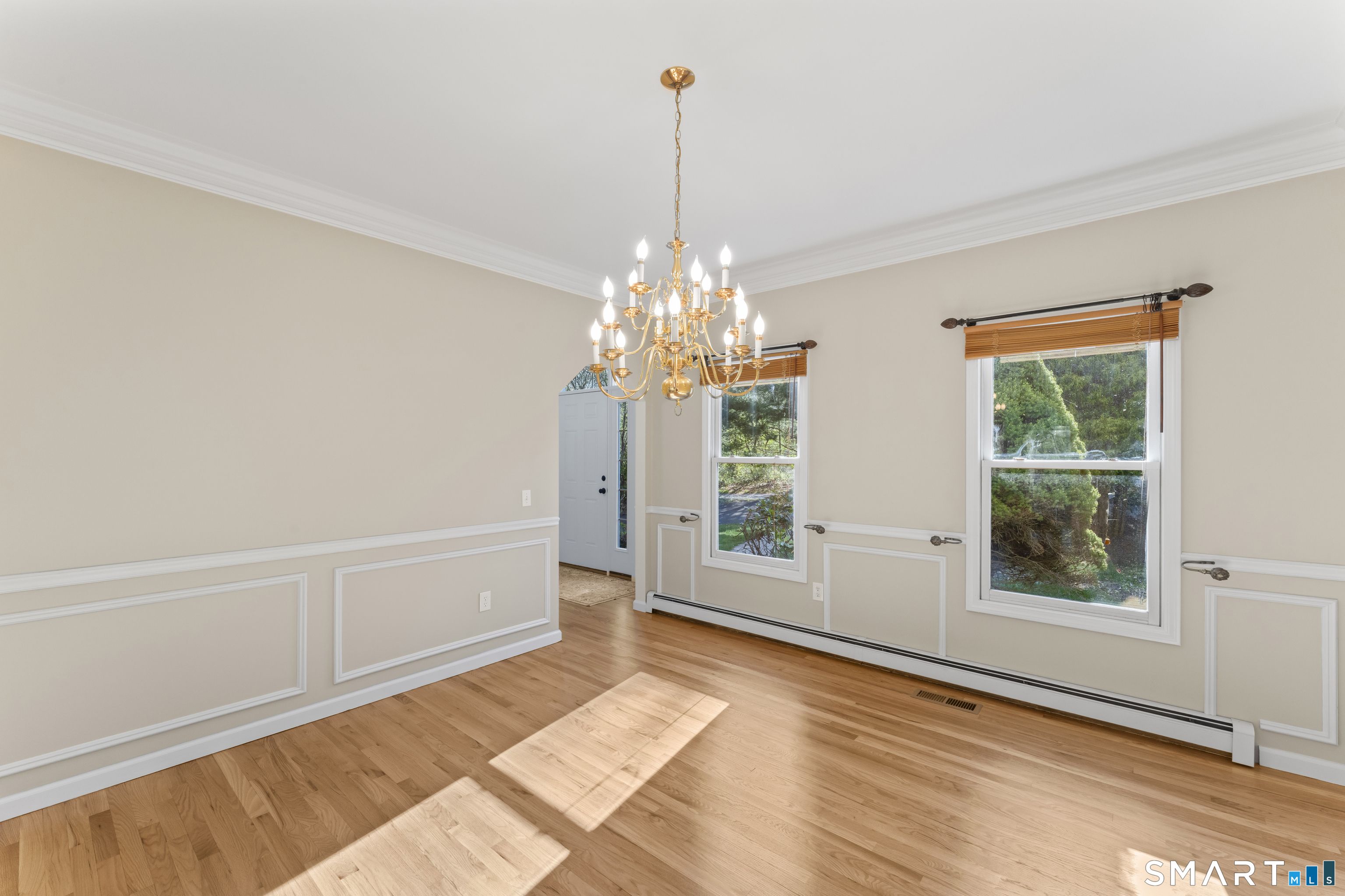 5 Beagle Trail Newtown, CT 06482 - Photo 10 of 40 a view of an empty room with a window