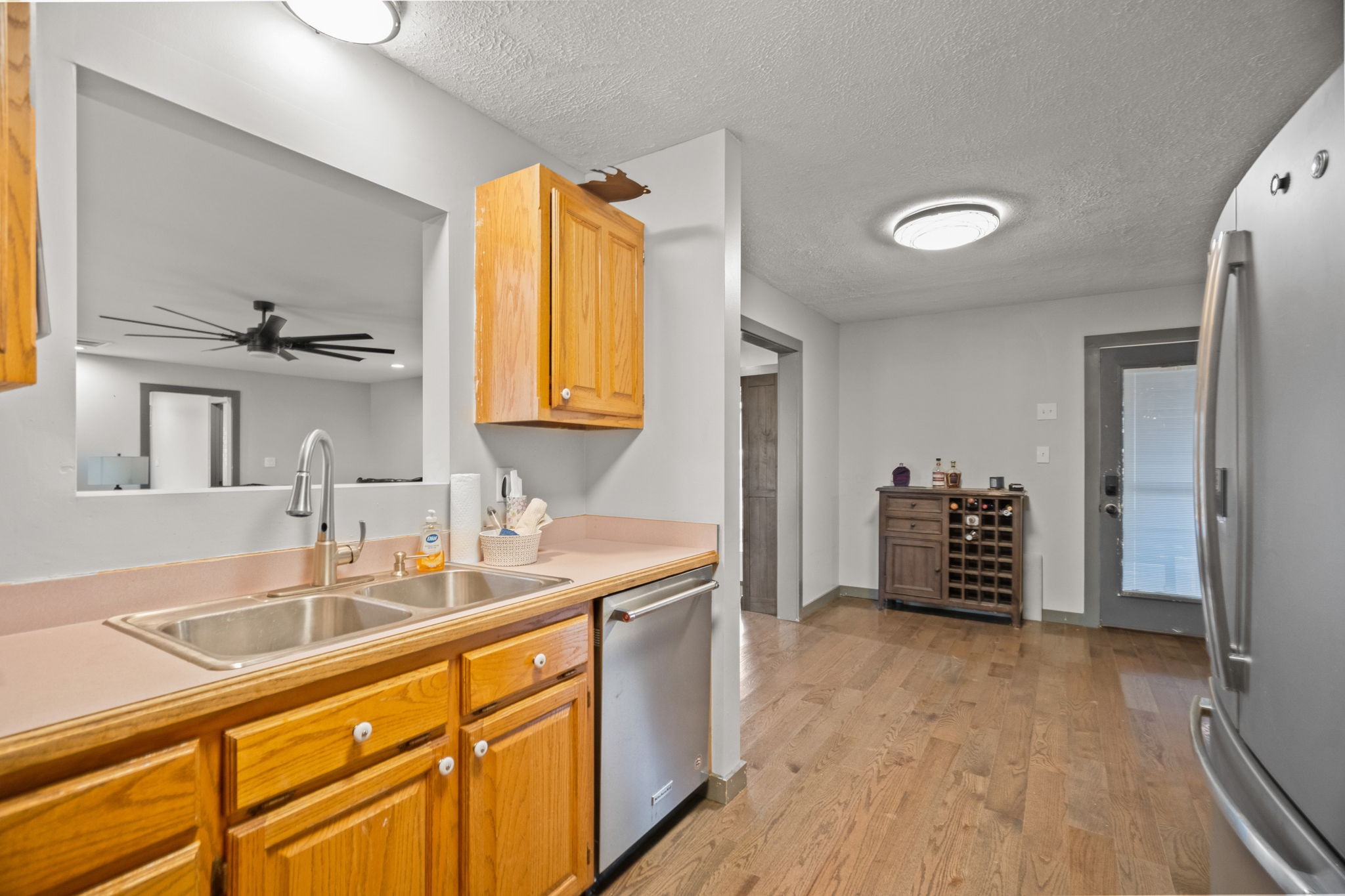 6117 Henry Gower Road Pleasant View, TN 37146 - Photo 14 of 61 a kitchen with stainless steel appliances granite countertop a sink and a refrigerator
