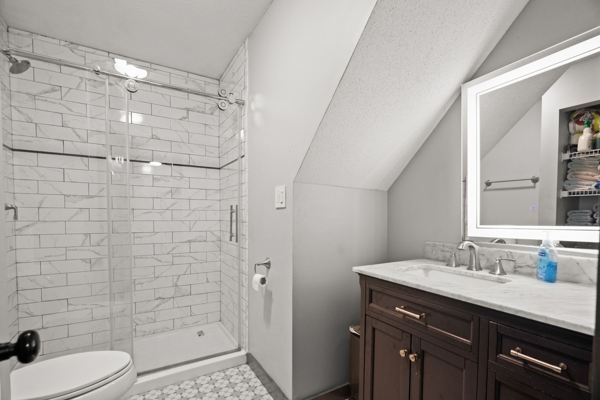 6117 Henry Gower Road Pleasant View, TN 37146 - Photo 31 of 61 a bathroom with a sink a toilet and shower