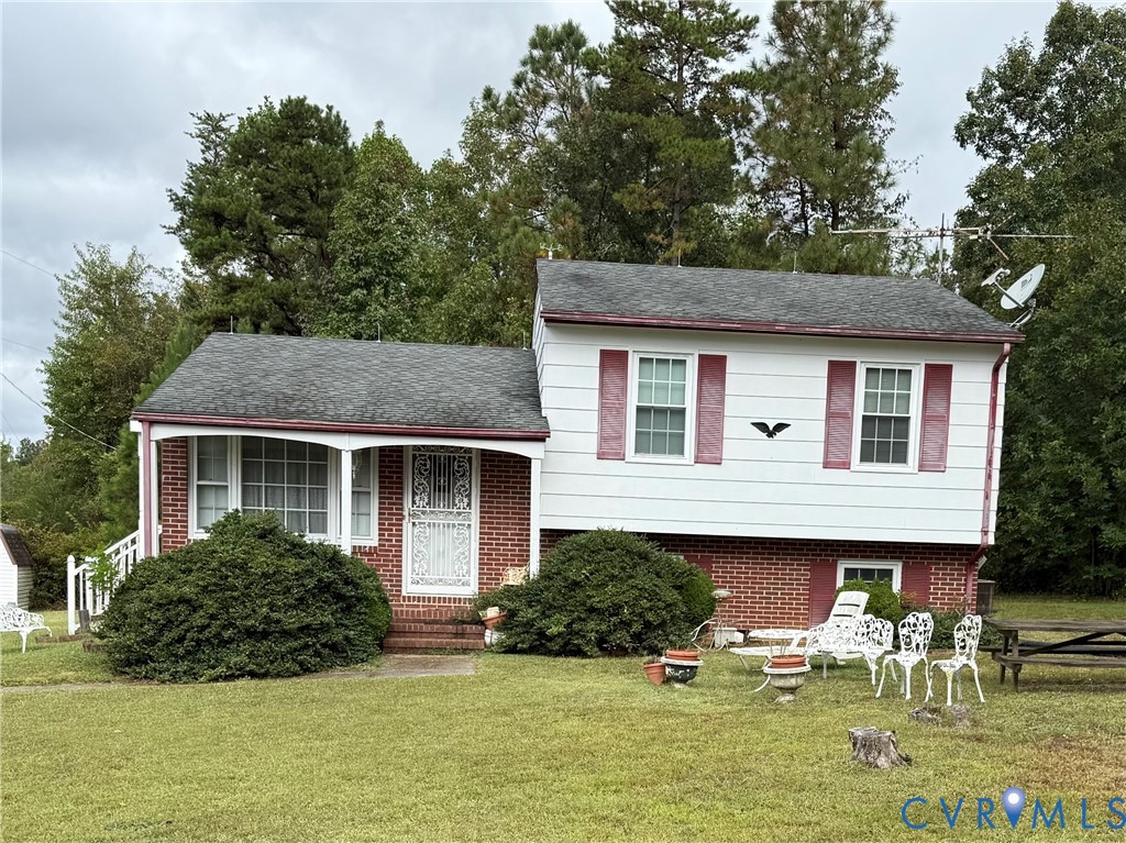 1455 Indian Oak Road Crewe, VA 23930 - Photo 1 of 3 a front view of house with yard and green space