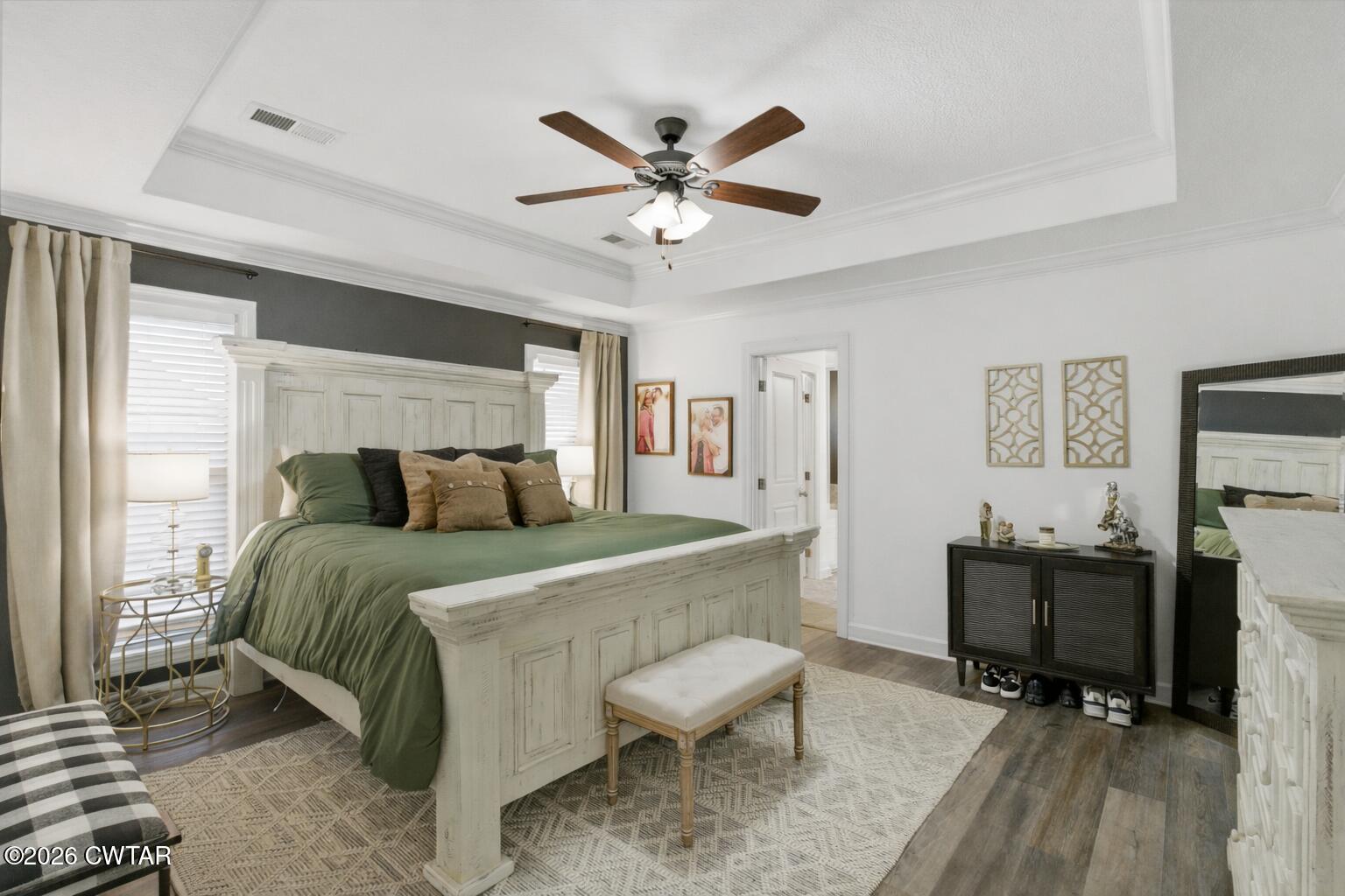 5 Pinehill Cove Jackson, TN 38305 - Photo 17 of 47 a bedroom with a bed and a desk