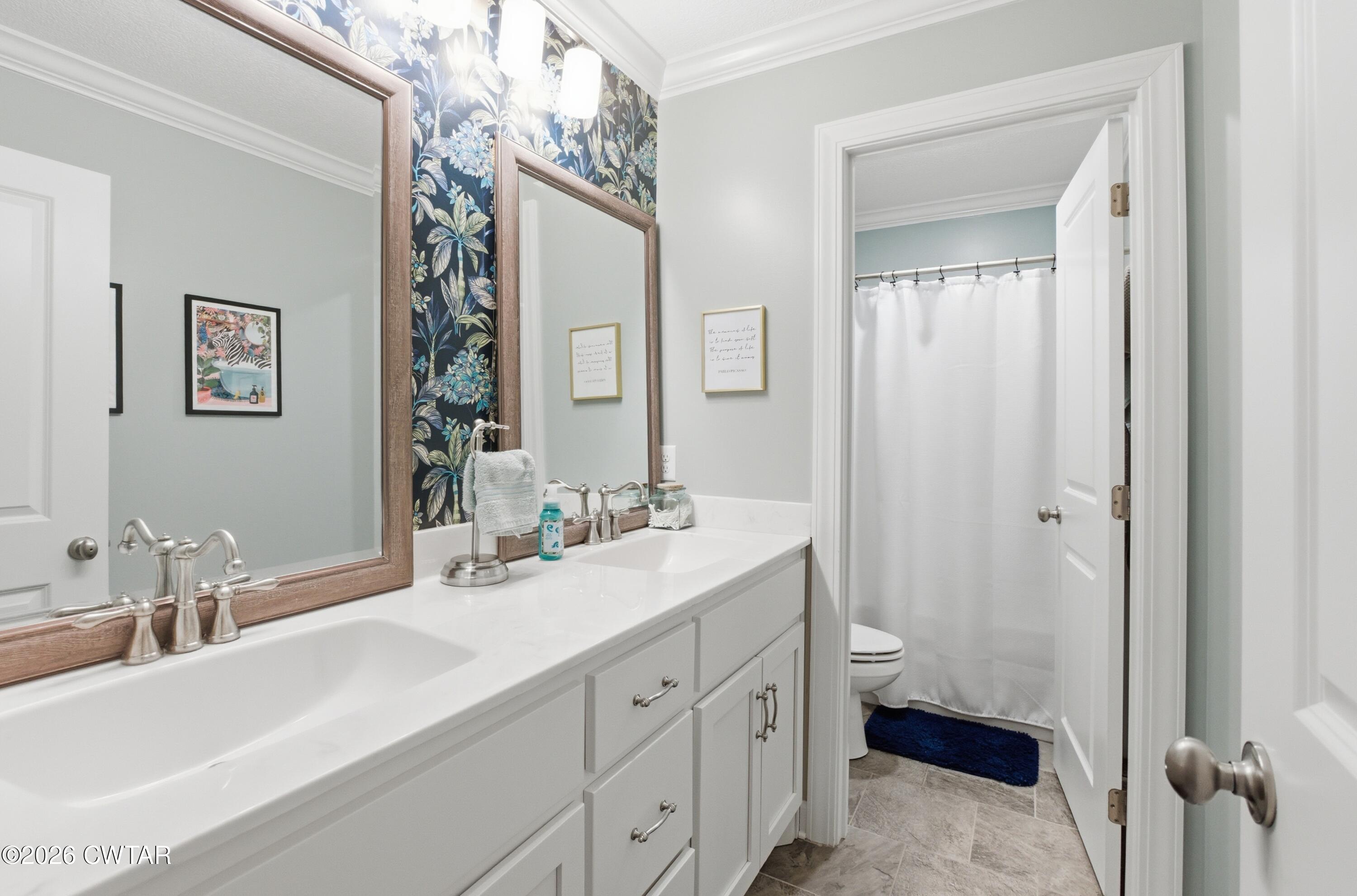 5 Pinehill Cove Jackson, TN 38305 - Photo 28 of 47 a bathroom with a sink and a mirror