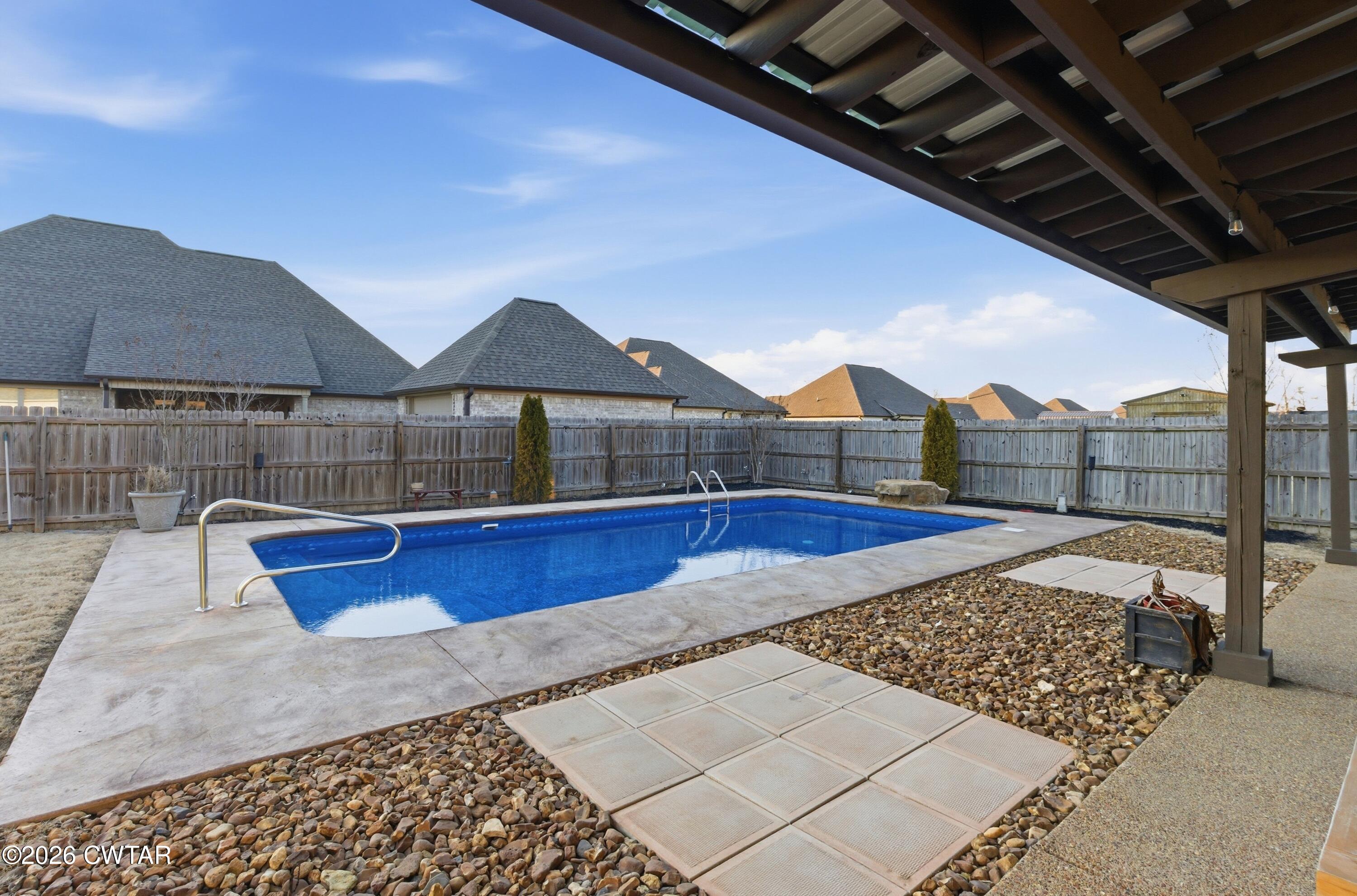 5 Pinehill Cove Jackson, TN 38305 - Photo 36 of 47 a view of outdoor space and deck with swimming pool