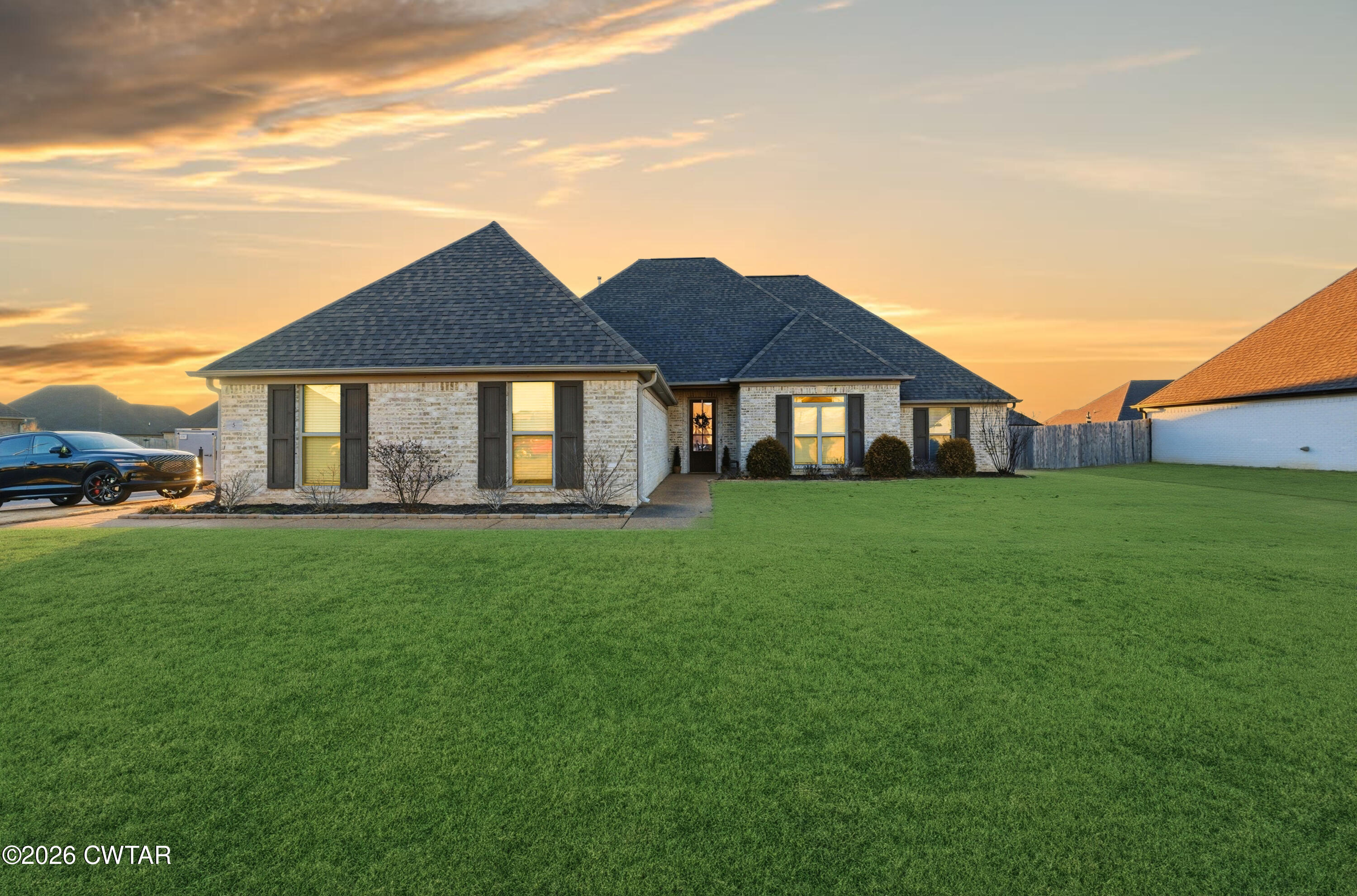 5 Pinehill Cove Jackson, TN 38305 - Photo 38 of 47 a front view of a house with a yard