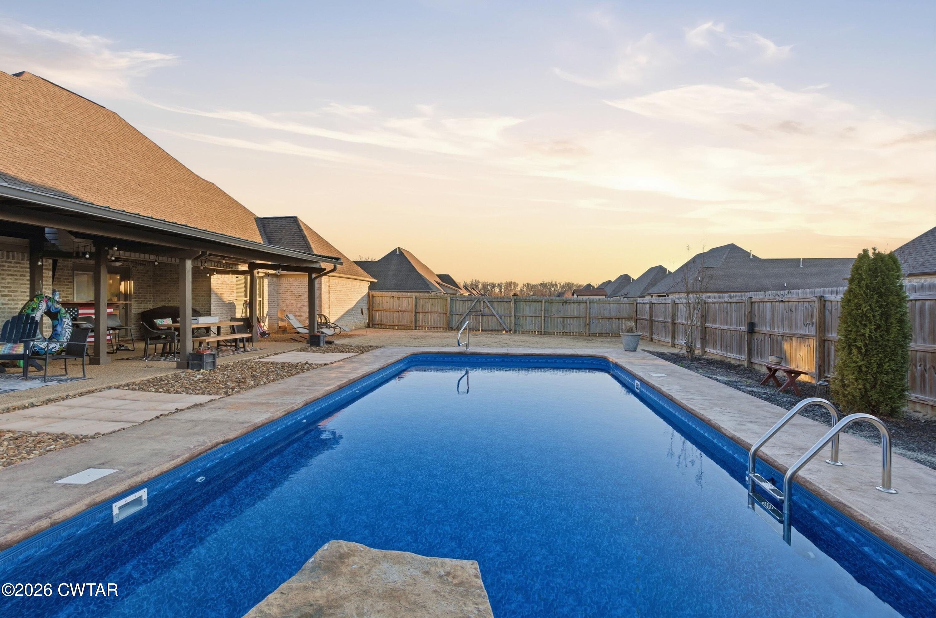 5 Pinehill Cove Jackson, TN 38305 - Photo 44 of 47 a view of swimming pool with outdoor seating
