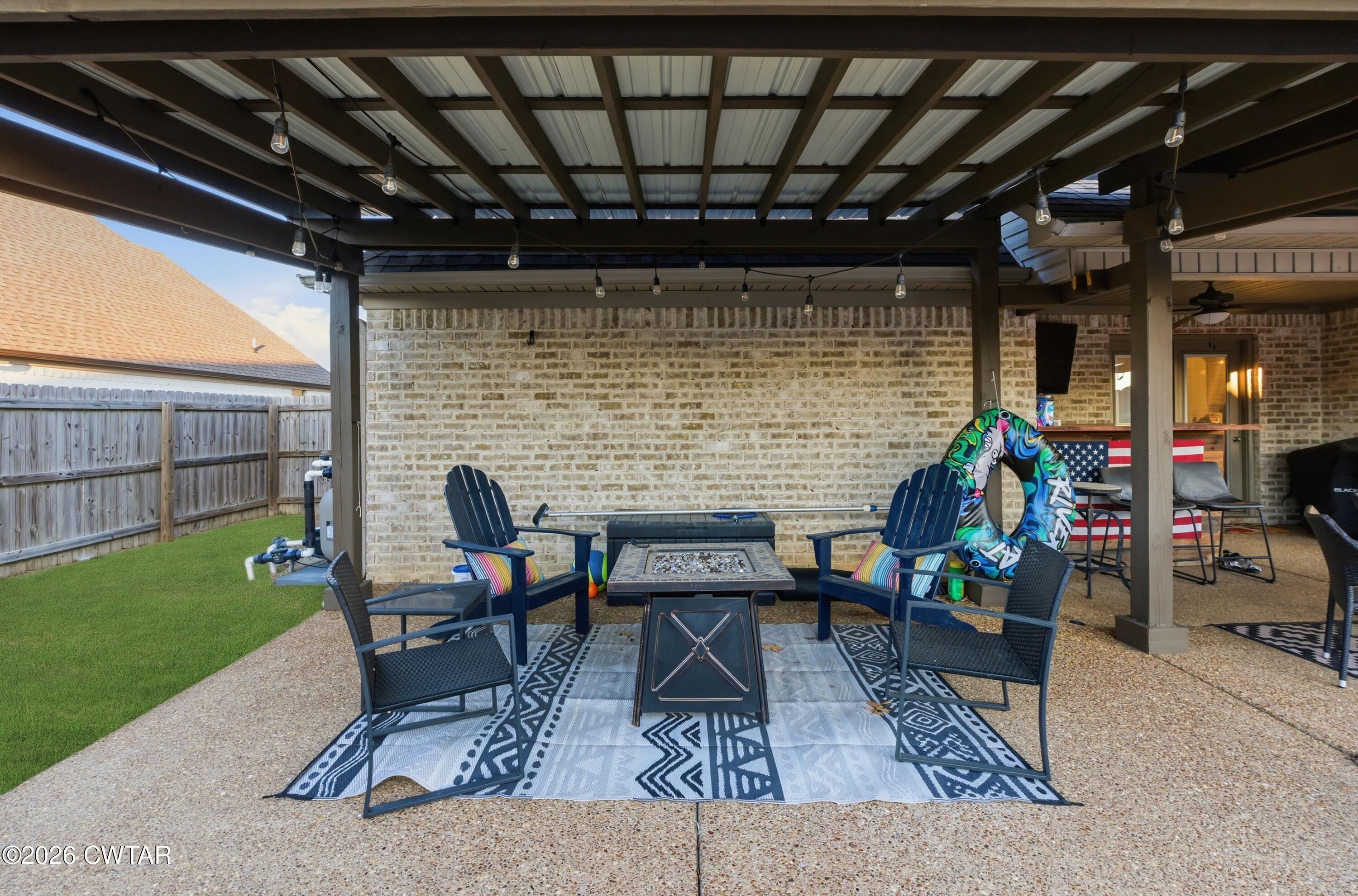 5 Pinehill Cove Jackson, TN 38305 - Photo 47 of 47 a outdoor living space with furniture and a fireplace