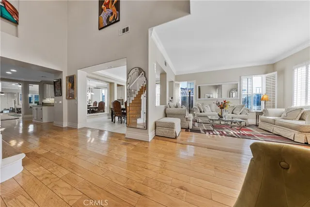 a view of a living room and dining room