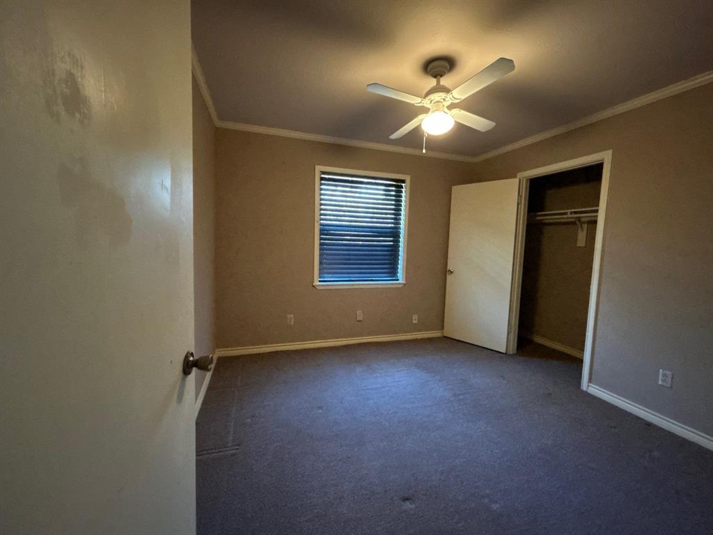 928 Vz County Road 3828 Wills Point, TX 75169 - Photo 20 of 29 an empty room with fan and windows