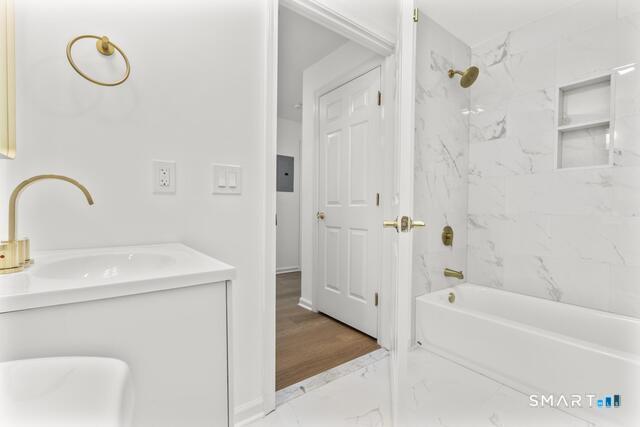 468 Main Street, Unit 111 East Lyme, CT 06357 - Photo 19 of 25 a bathroom with a sink a toilet and shower