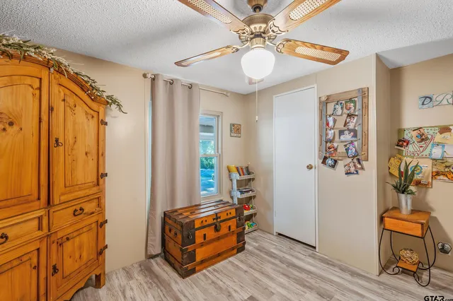 a bathroom with a sink and a shower curtain