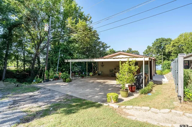 a view of a backyard with a garden