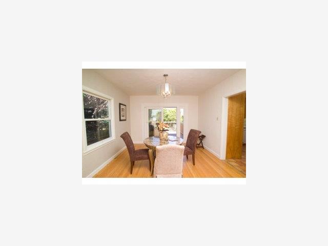 34 Stanley Road Burlingame, CA 94010 - Photo 3 of 9 a living room with furniture and a table