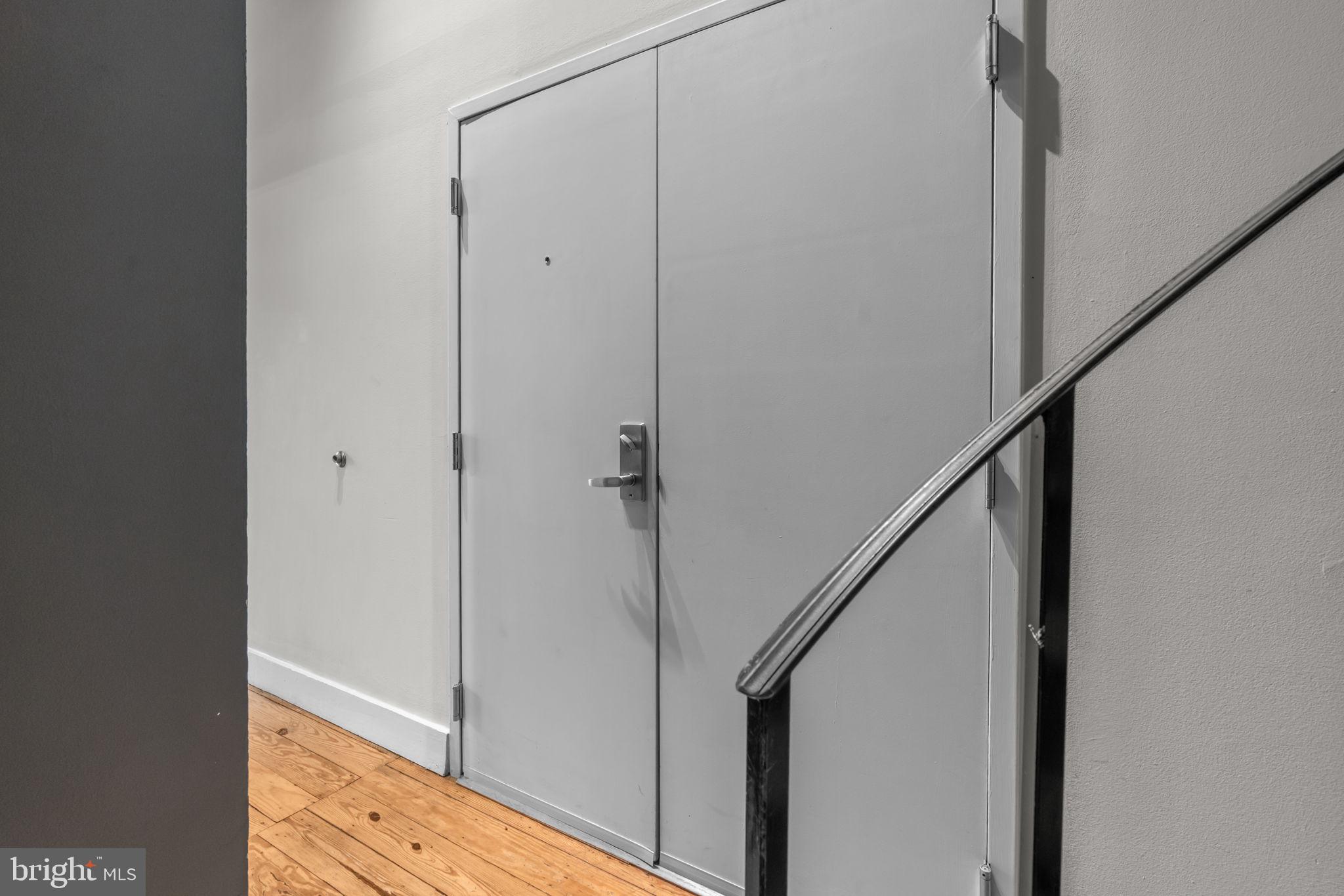 309 Arch Street, Unit 301 Philadelphia, PA 19106 - Photo 31 of 36 a view of hallway with stairs