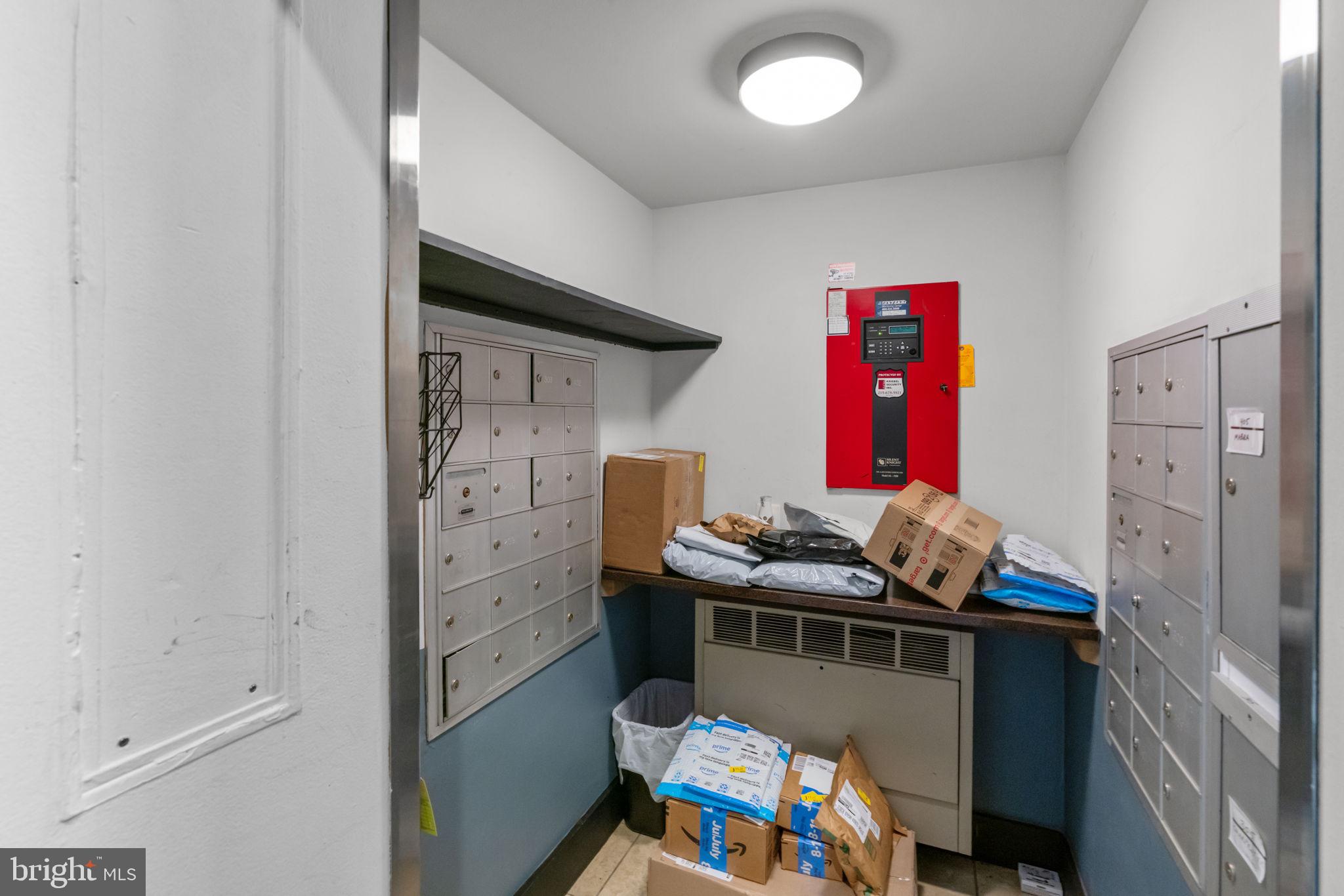 309 Arch Street, Unit 301 Philadelphia, PA 19106 - Photo 33 of 36 a room with furniture and wooden floor
