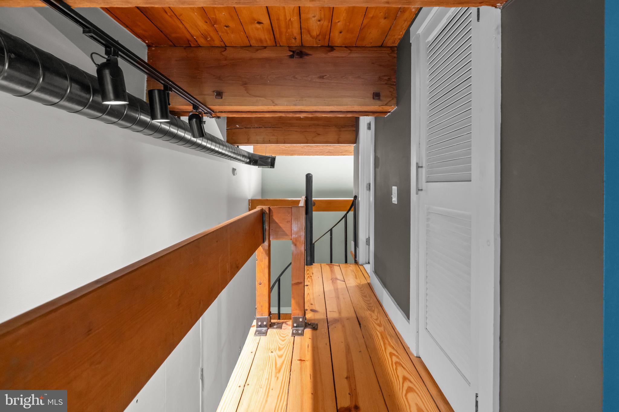 309 Arch Street, Unit 301 Philadelphia, PA 19106 - Photo 5 of 36 a view of balcony with wooden floor