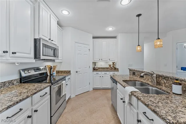 $395,599 | 23440 Alamanda Drive, Unit 103, Estero, FL 34135