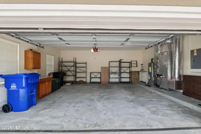 a view of a porch with furniture and a backyard