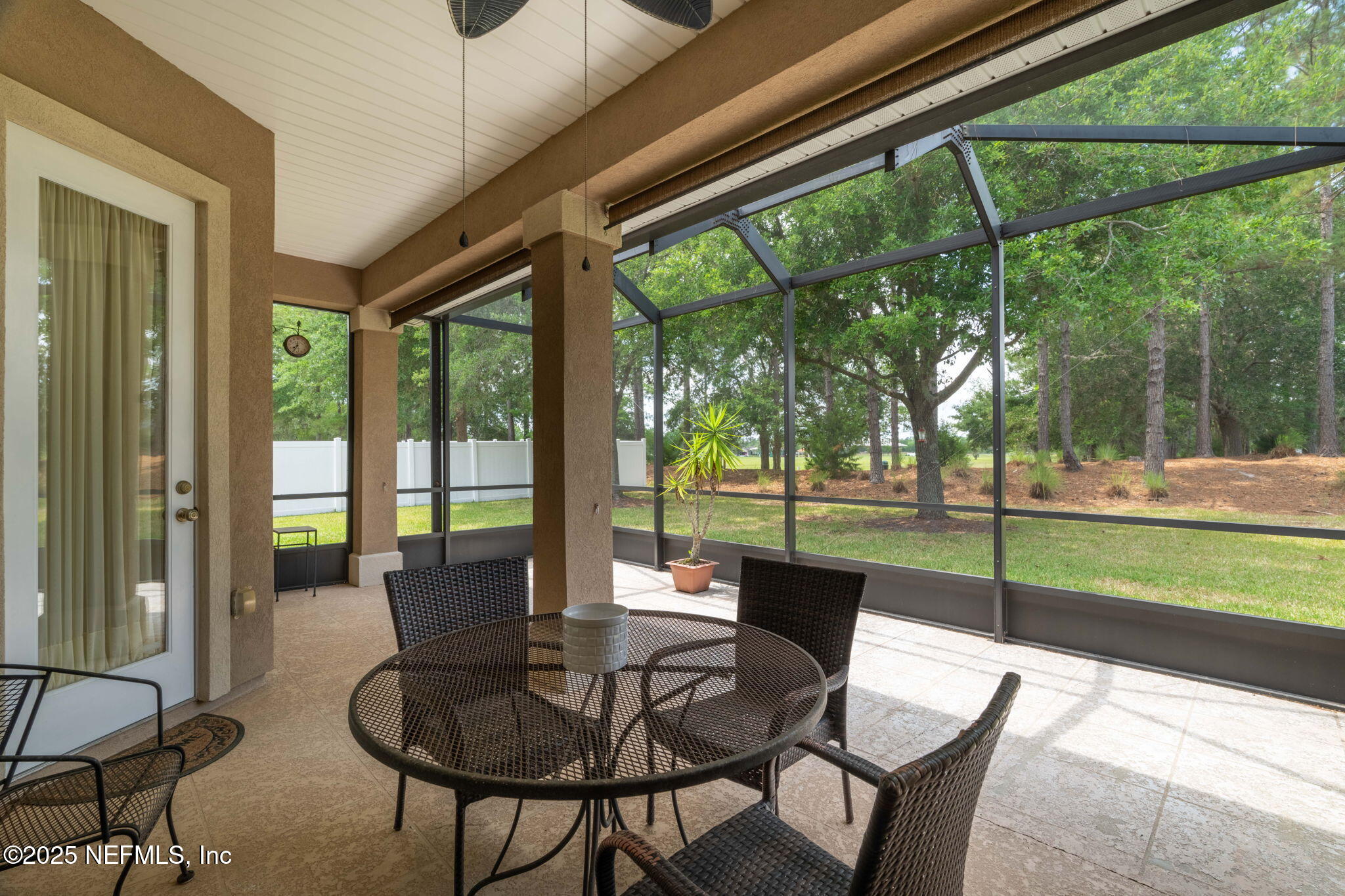 232 Porta Rosa Circle St. Augustine, FL 32092 - Photo 29 of 42 a view of a porch with furniture and a backyard
