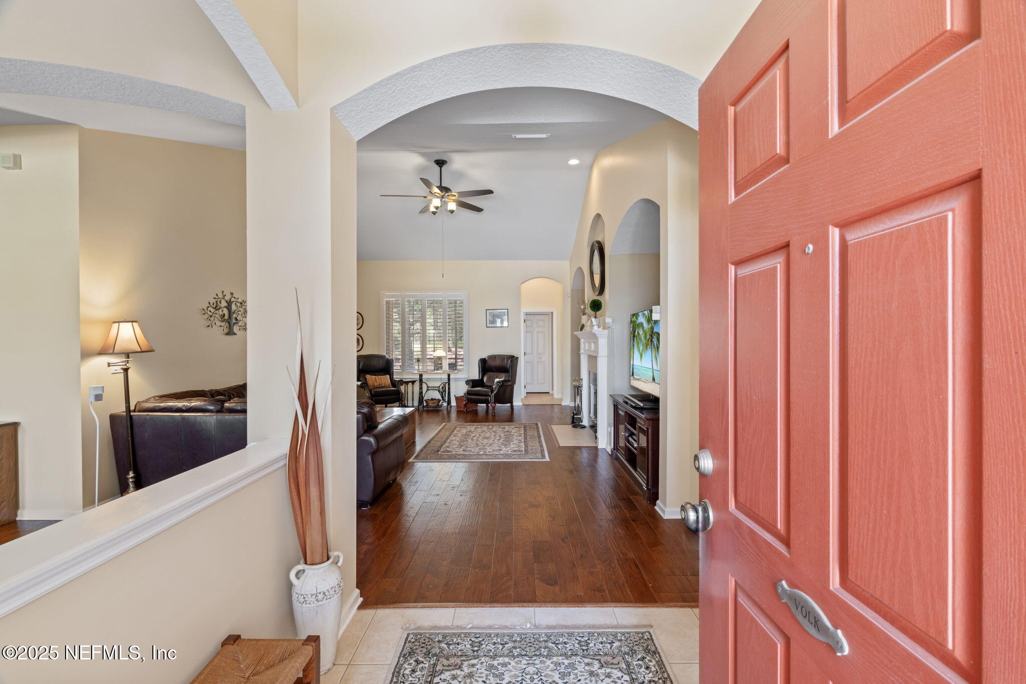 232 Porta Rosa Circle St. Augustine, FL 32092 - Photo 4 of 42 a living room with furniture and a flat screen tv