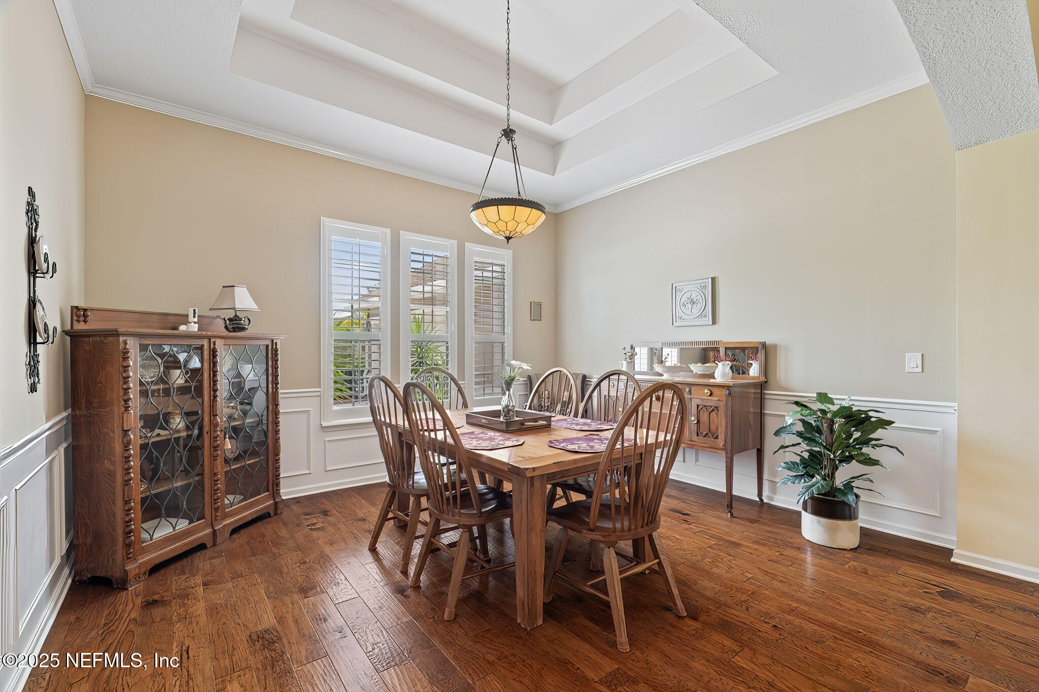 232 Porta Rosa Circle St. Augustine, FL 32092 - Photo 6 of 42 a view of a dining room with furniture window and wooden floor