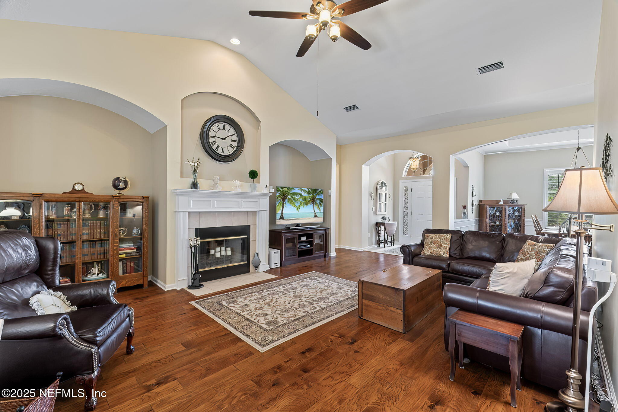 232 Porta Rosa Circle St. Augustine, FL 32092 - Photo 9 of 42 a living room with furniture and a fireplace