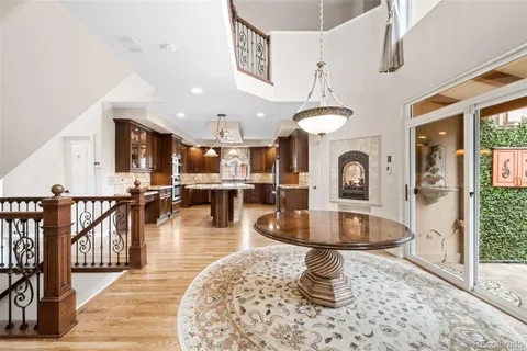 a kitchen with granite countertop cabinets sink and window