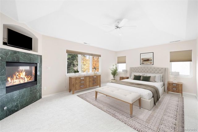 a spacious bathroom with a double vanity sink mirror and double