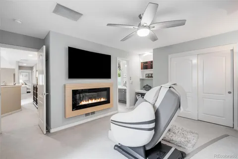 a room with furniture and a flat screen tv