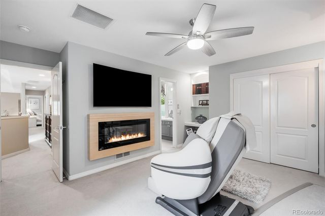 a room with furniture and a flat screen tv