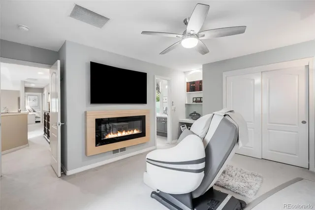 a room with furniture and a flat screen tv