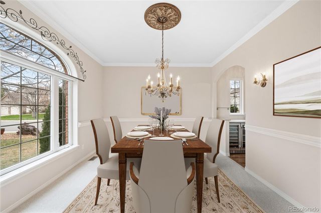 a kitchen with granite countertop lots of counter top space and wooden floor