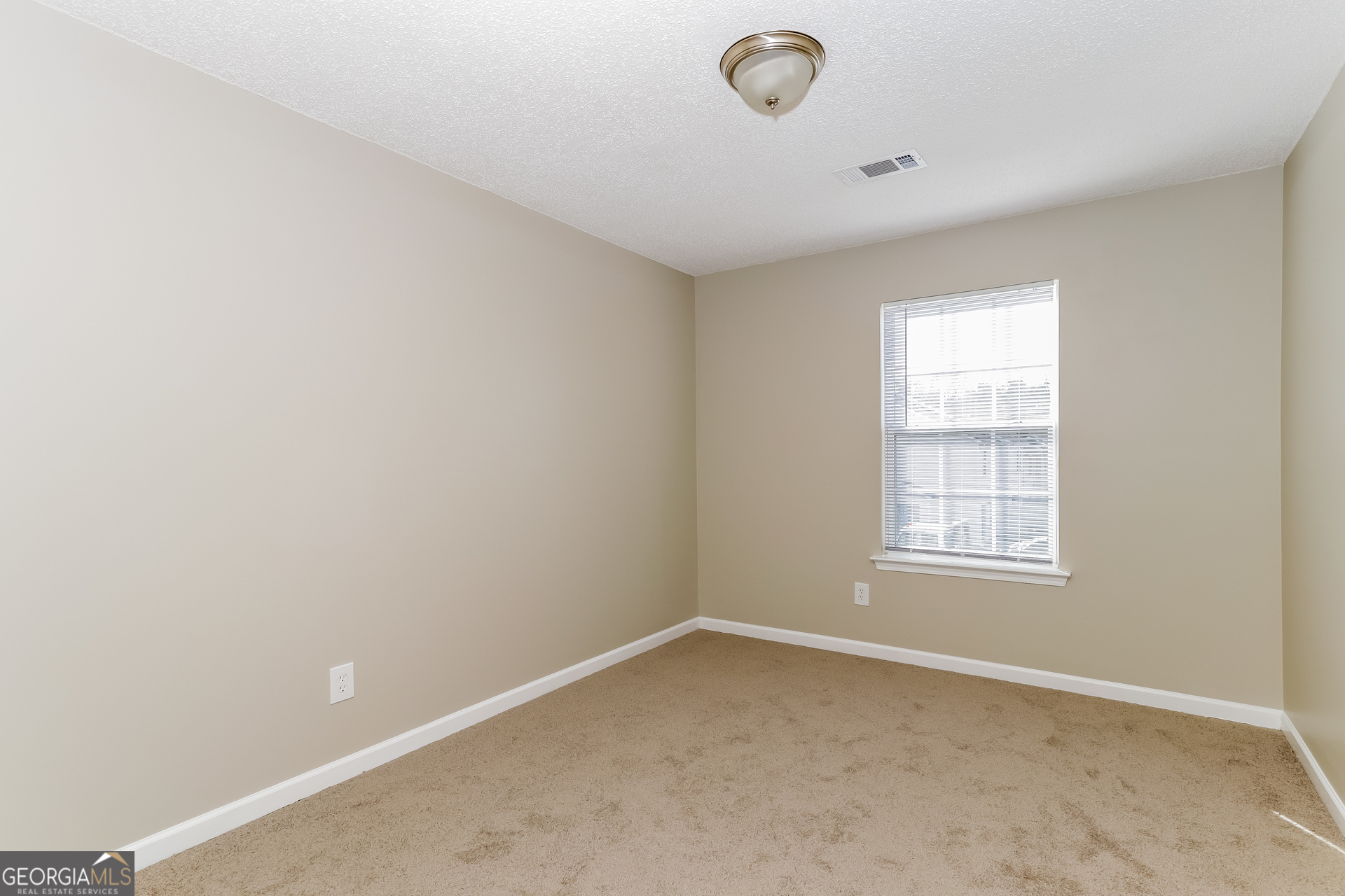 5319 Creekview Way Morrow, GA 30260 - Photo 11 of 17 an empty room with a window