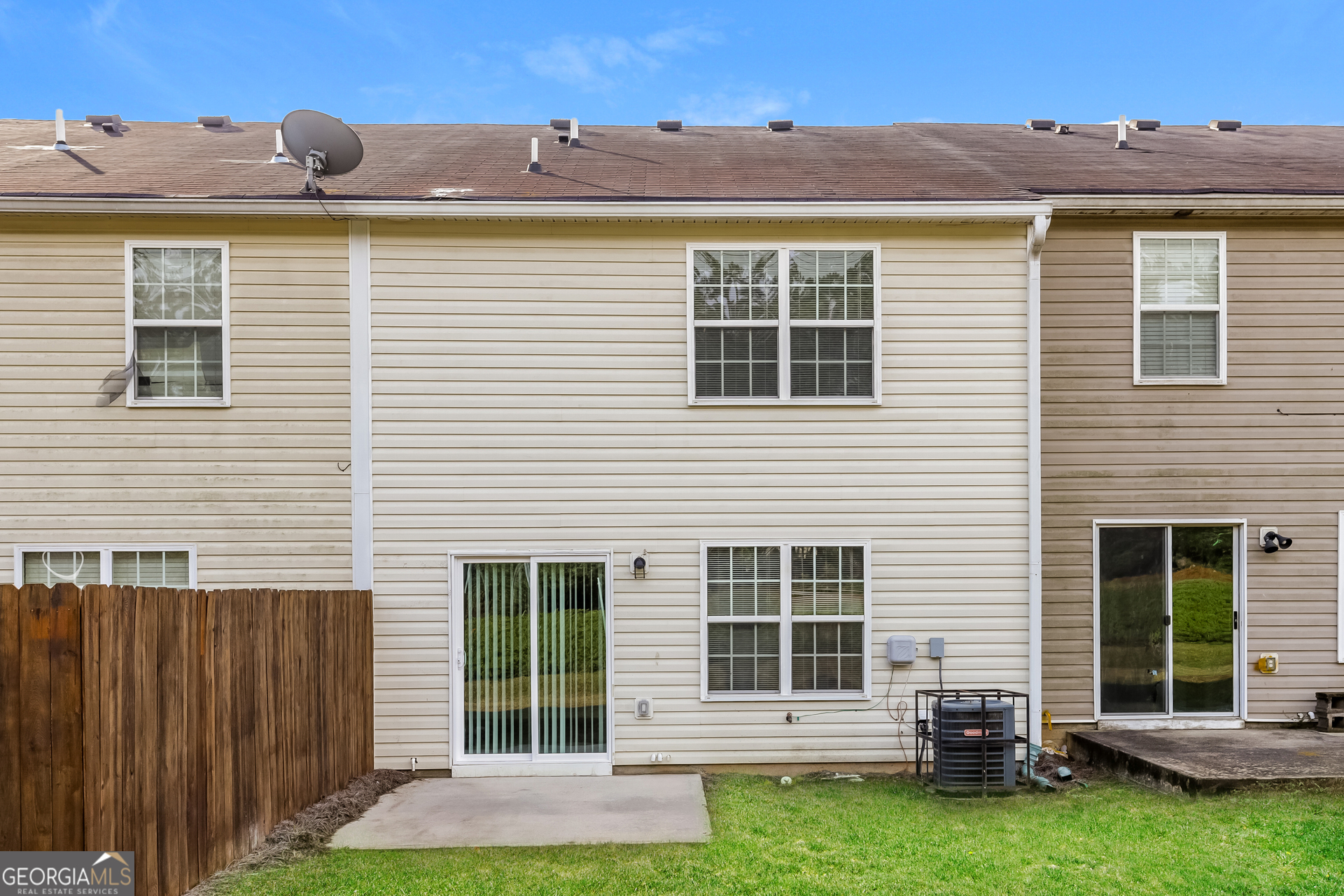 5319 Creekview Way Morrow, GA 30260 - Photo 14 of 17 a front view of a house with a garden