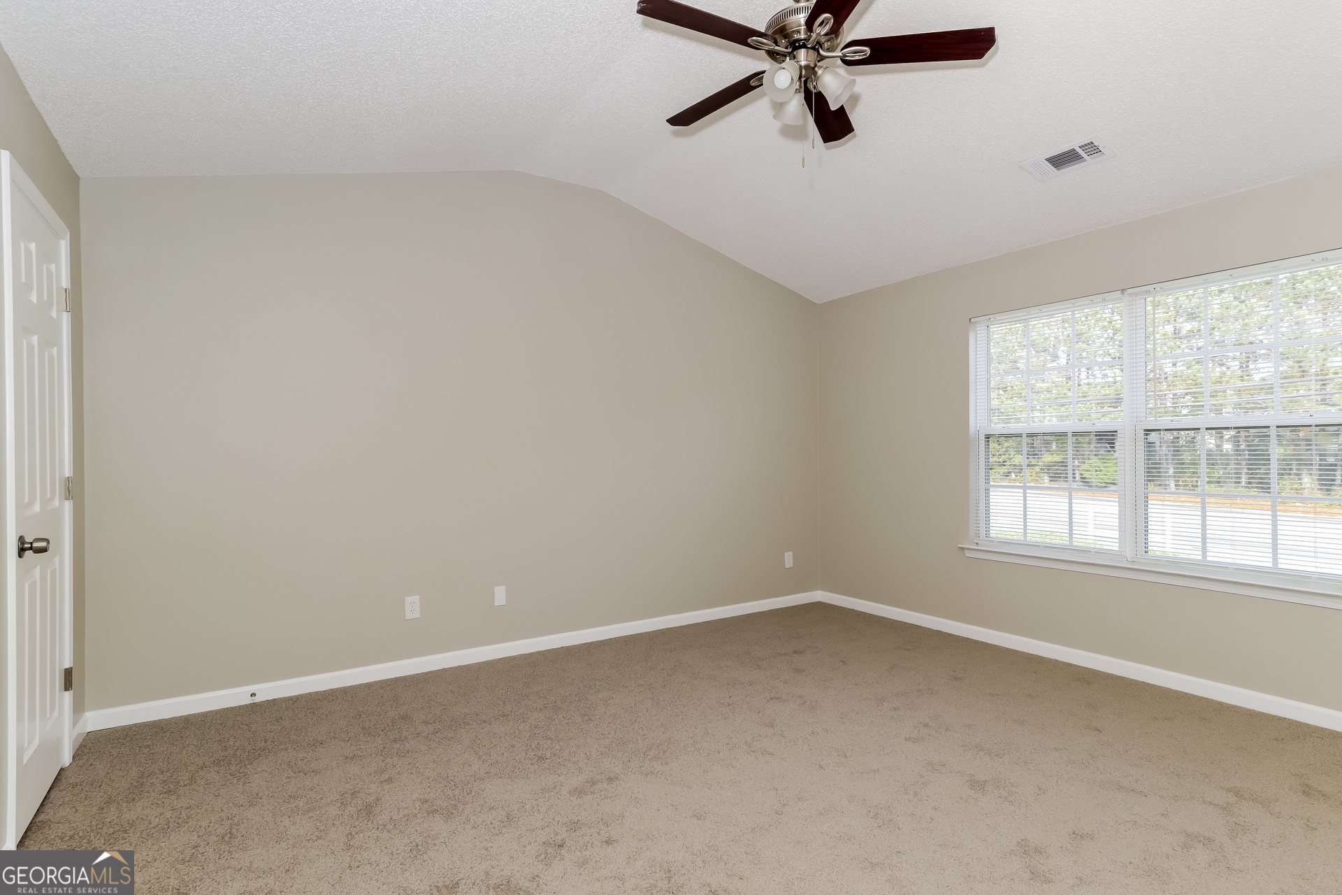 5319 Creekview Way Morrow, GA 30260 - Photo 7 of 17 an empty room with a window