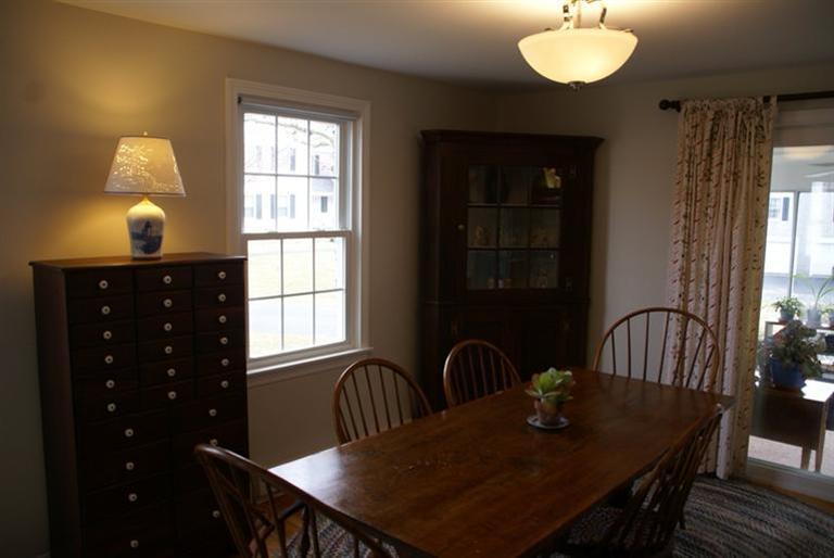 95 Depot Road, Unit 14 Chatham, MA 02633 - Photo 4 of 11 a view of a dining room with furniture and window
