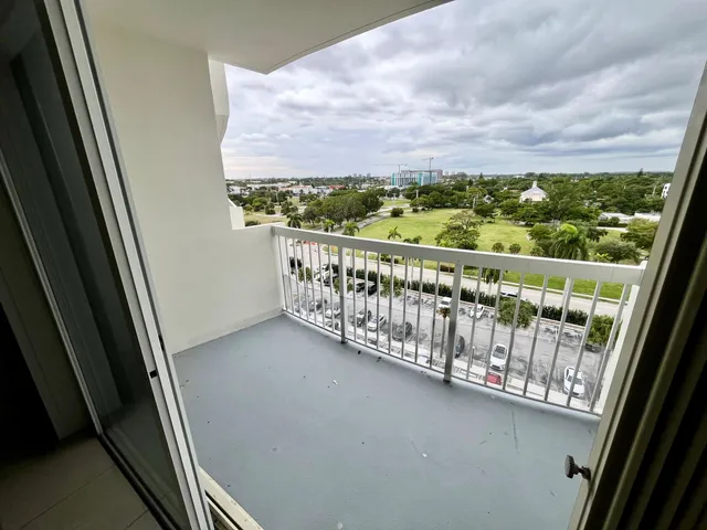 a view of balcony with furniture