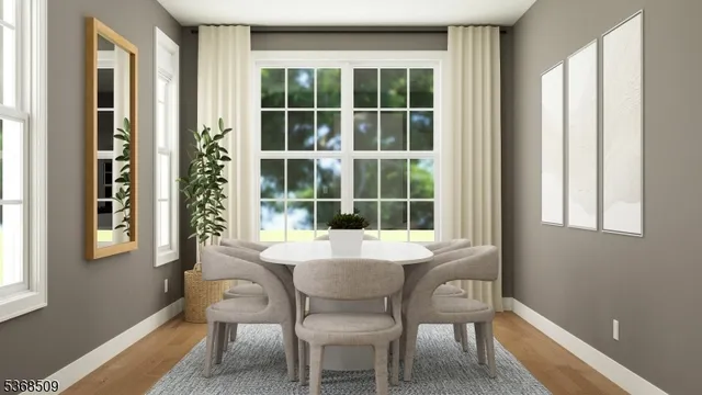 a dining room with furniture and window